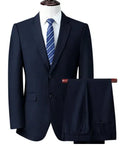 Men's slim fit business suit in black with coat and trousers on a hanger