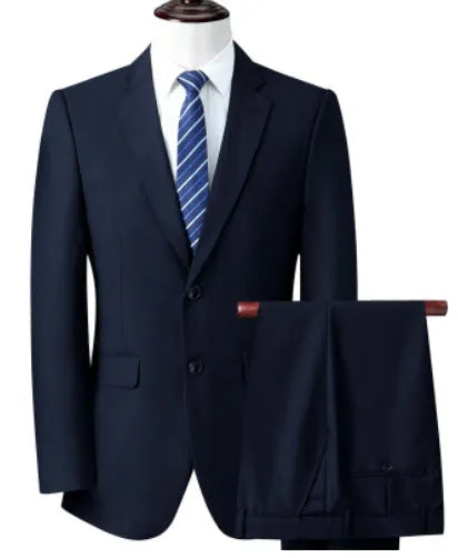 Men's slim fit business suit in black with coat and trousers on a hanger