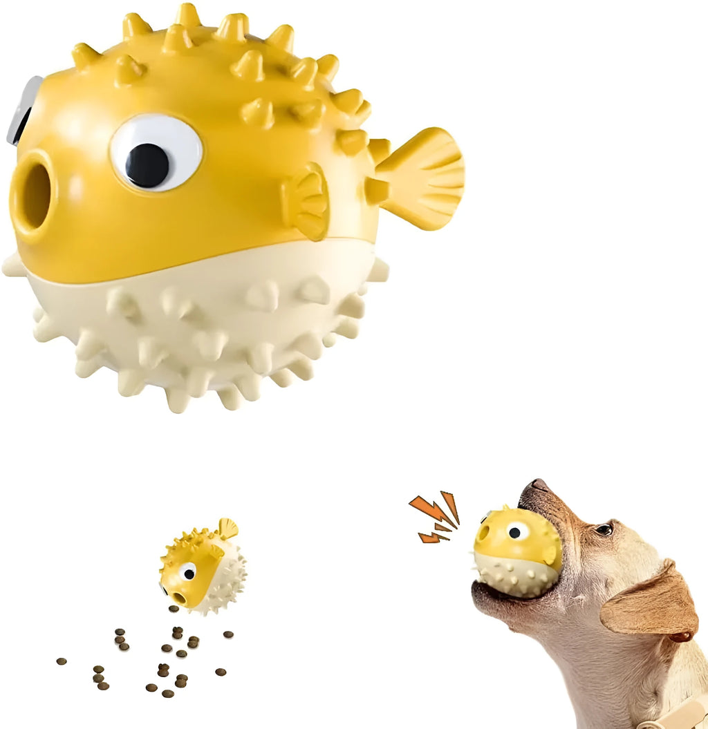 Green fish-shaped dog chew toy with textured surface, shown next to dog treats.