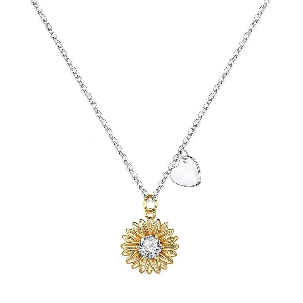 Adjustable 925 silver sunflower necklace with daisy-petal pendant on a cross chain.
