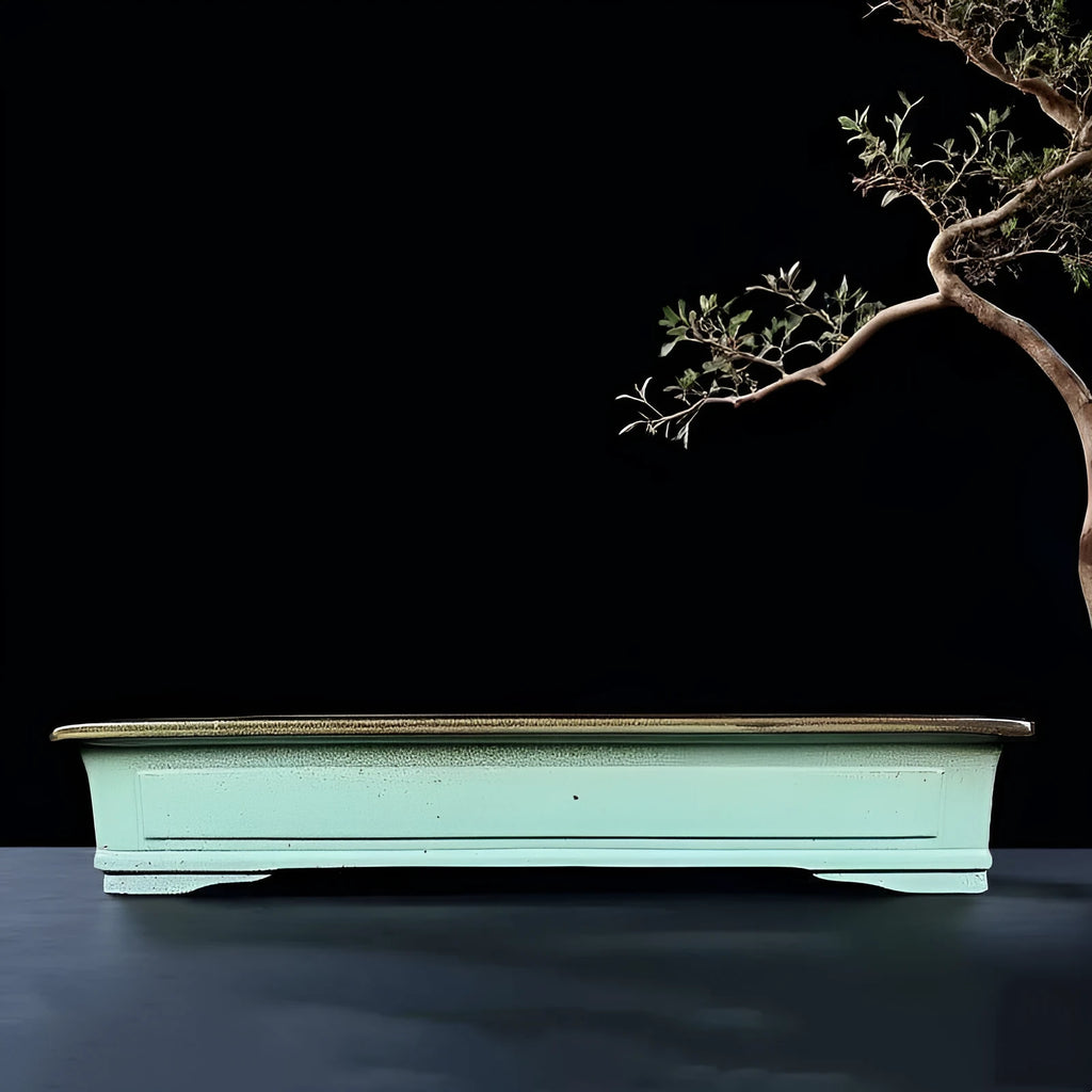 Green handmade ceramic bonsai pot with a retro crackle glaze finish.