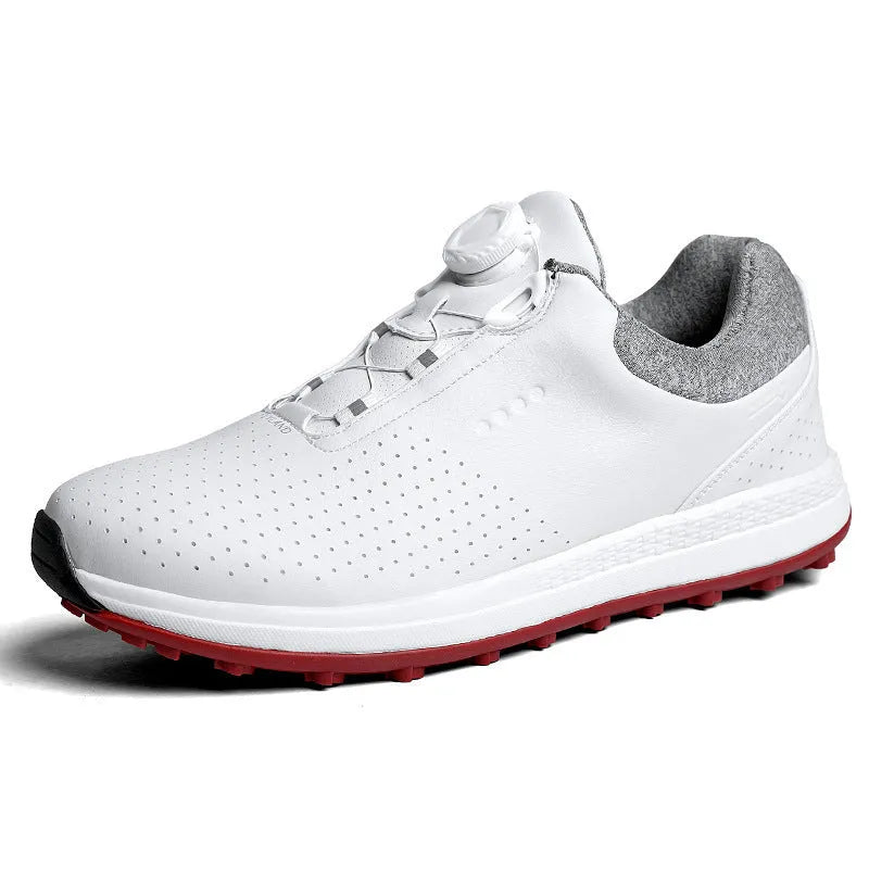 Men's white low top golf sneakers with breathable holes and a textured non-slip sole.