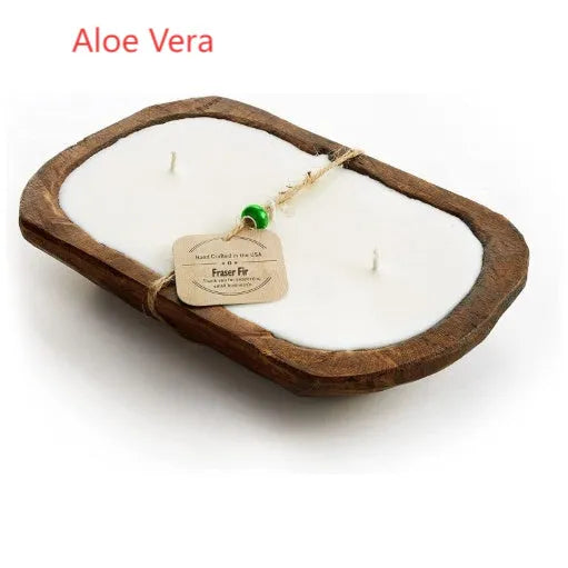 Lavender-scented soy wax candle in a wooden basin with a wooden wick