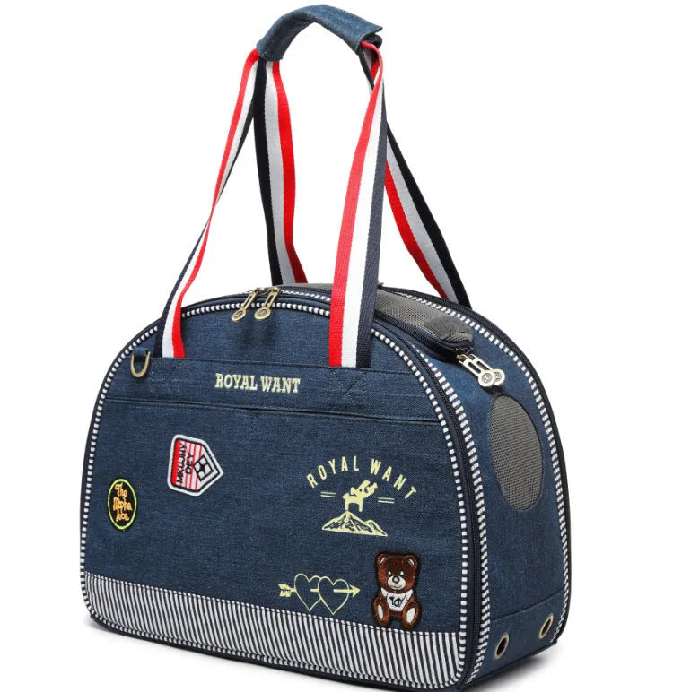 Blue denim pet diaper bag with cartoon pattern, dimensions 43cm by 20cm by 30cm