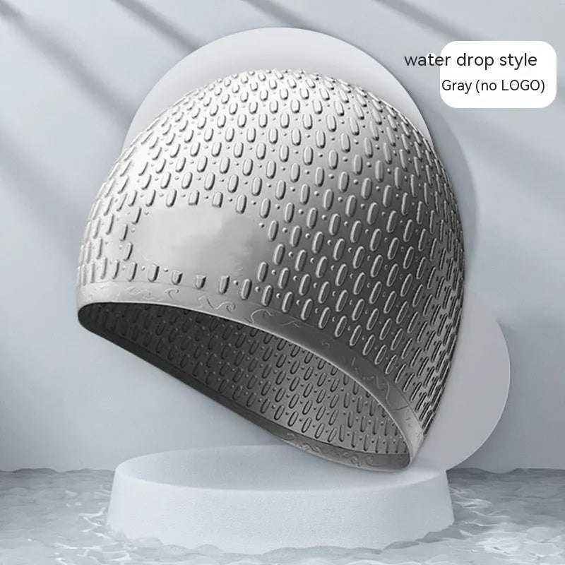 Solid colour silicone swimming cap for adults, shown in one of eight available colours including Tiffany Blue.