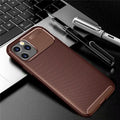 Black silicone protective case for an iPhone 12 smartphone on a table.