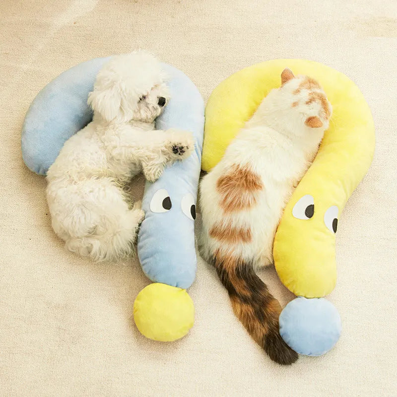 Blue rectangular pet pillow for cats and dogs on a floor, dimensions 62cm by 39cm.