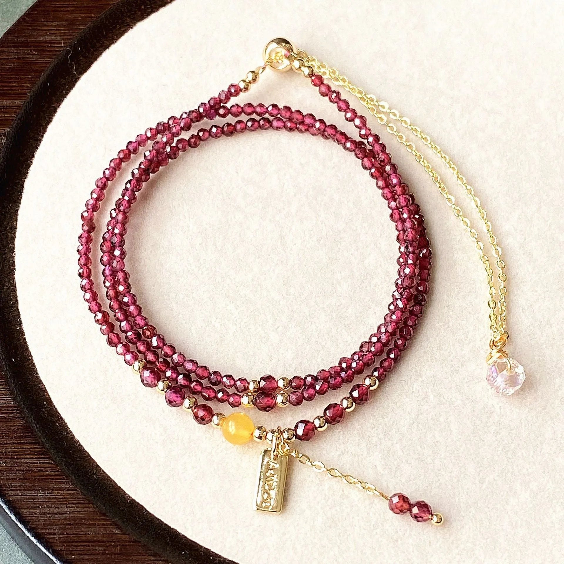 Wine red garnet bracelet necklace with three-circle design and beeswax cut surface texture