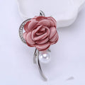 Rose brooch in Korean style, alloy construction, blue colour, 4.5cm by 3.8cm, on white background