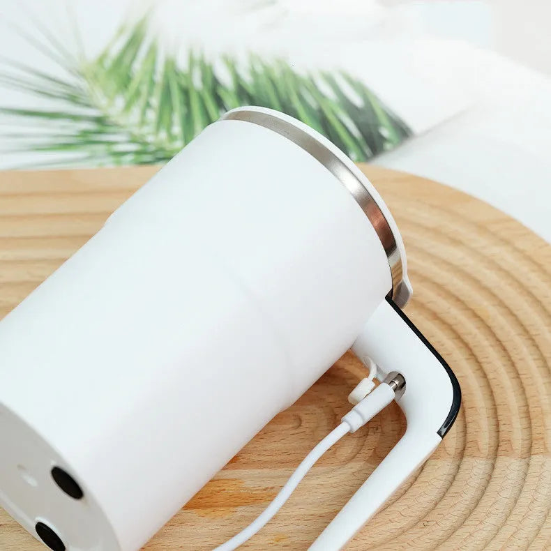 White automatic stirring electric mug with LCD temperature display and USB charging cable