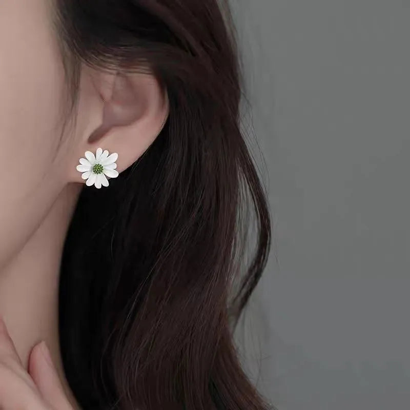Flower-shaped alloy stud earrings in white and green, yellow and white, blue and orange colour combinations