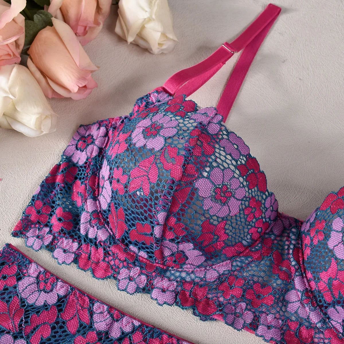Rose red women's embroidered bikini set with contrast colour details on polyester fabric