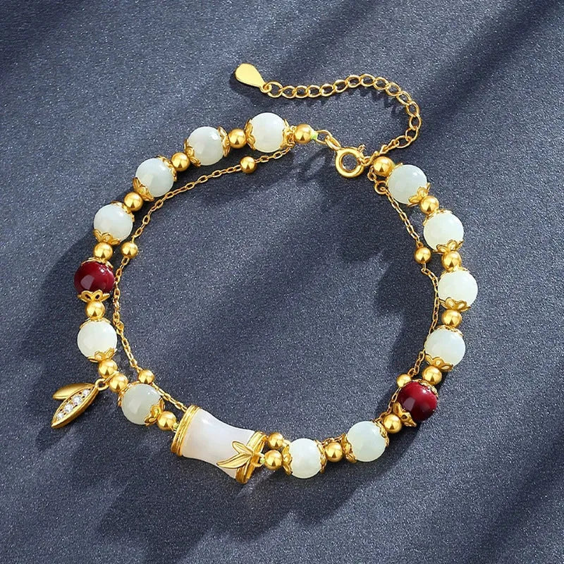 Glass and coloured glaze bracelet with floral design and ruyi elements in retro style