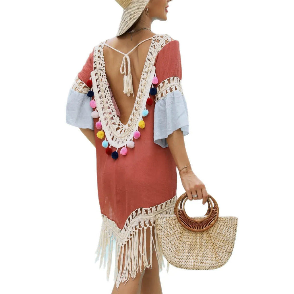 Orange floral beach overskirt with hand crochet detail and tassels, shown with a matching blouse.