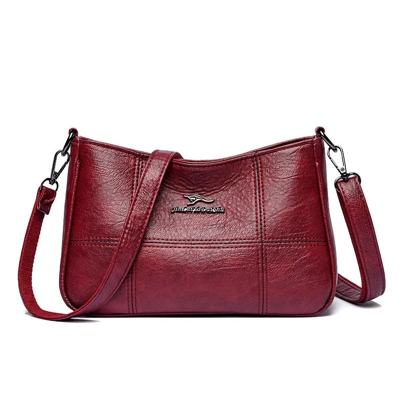 Cross stitching sheepskin small square bag for women in soft leather, available in multiple colours