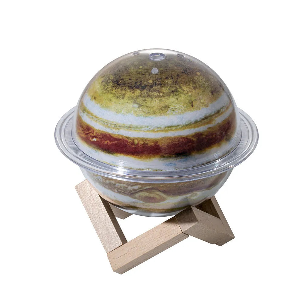 Planet design moon-shaped humidifier with LED night light in three colour modes, 250ml tank, on a wooden desk