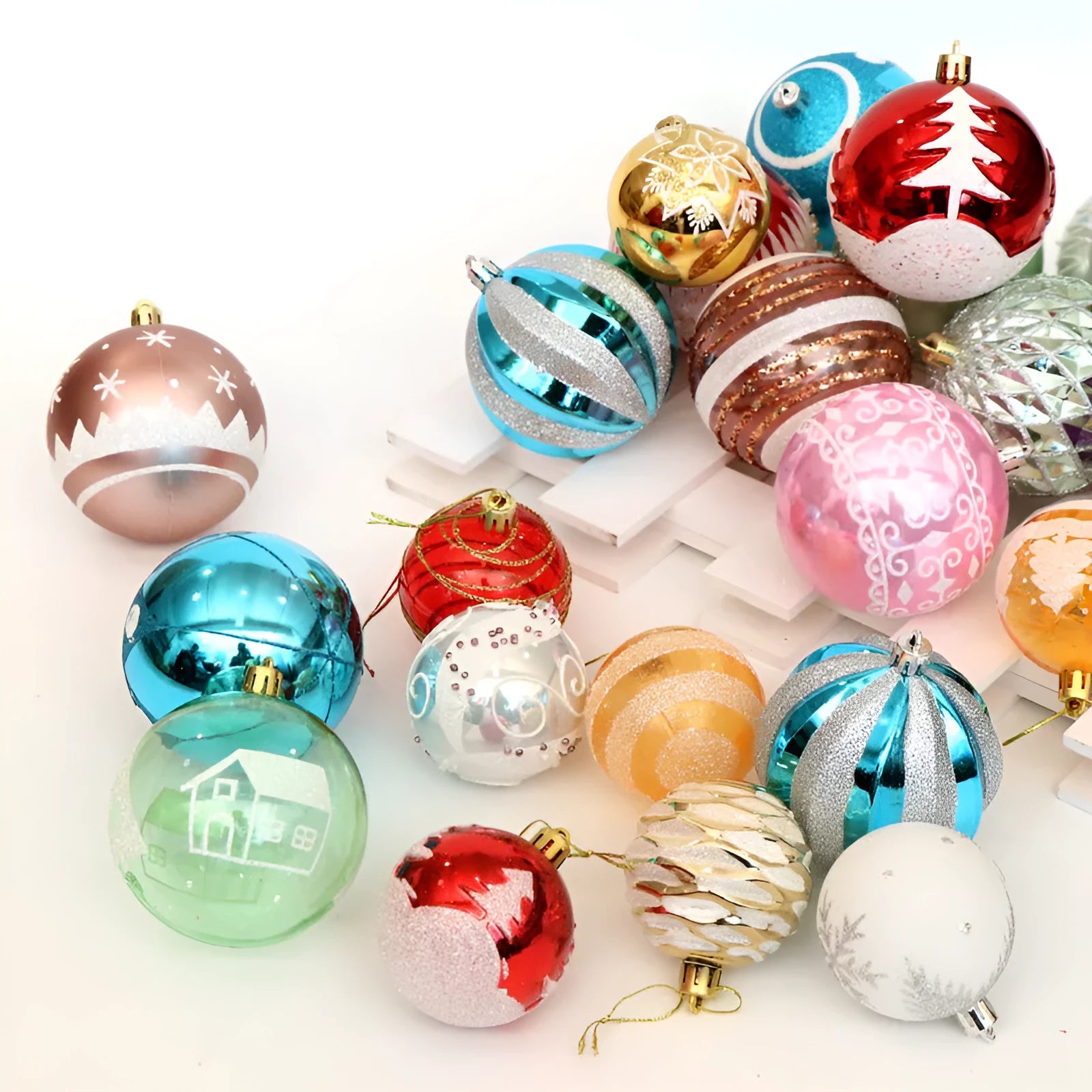 Set of 6cm round PVC Christmas baubles in various painted colours including red, gold, blue, and purple.