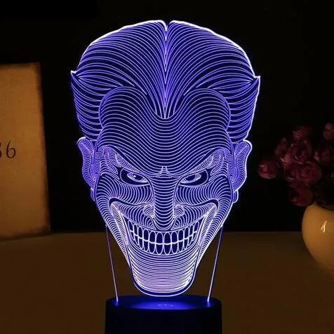 USB-powered 3D acrylic LED table lamp showing colourful gradient lighting on a desk.
