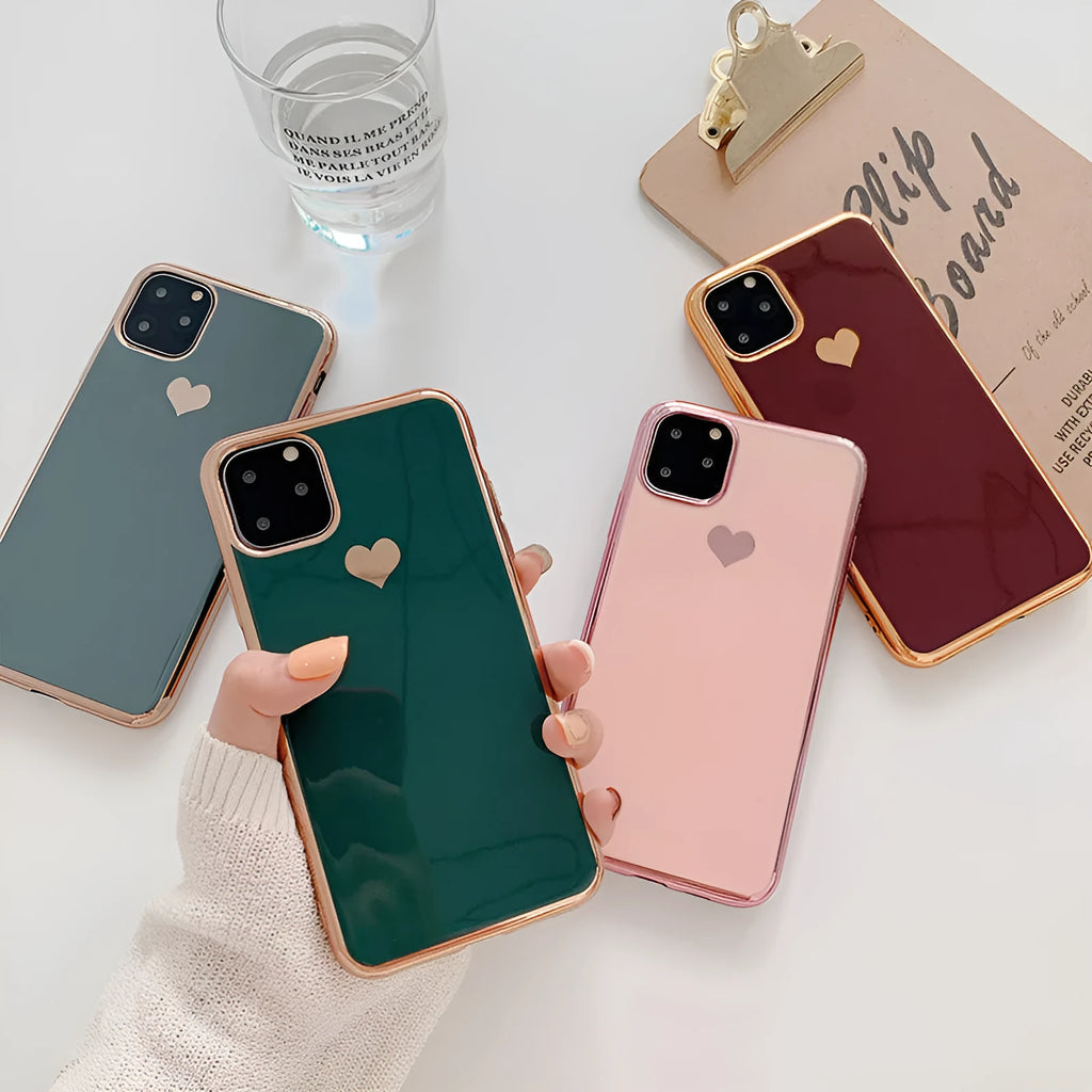 Solid colour TPU phone case for iPhone shown in blue, claret, pink, and green options
