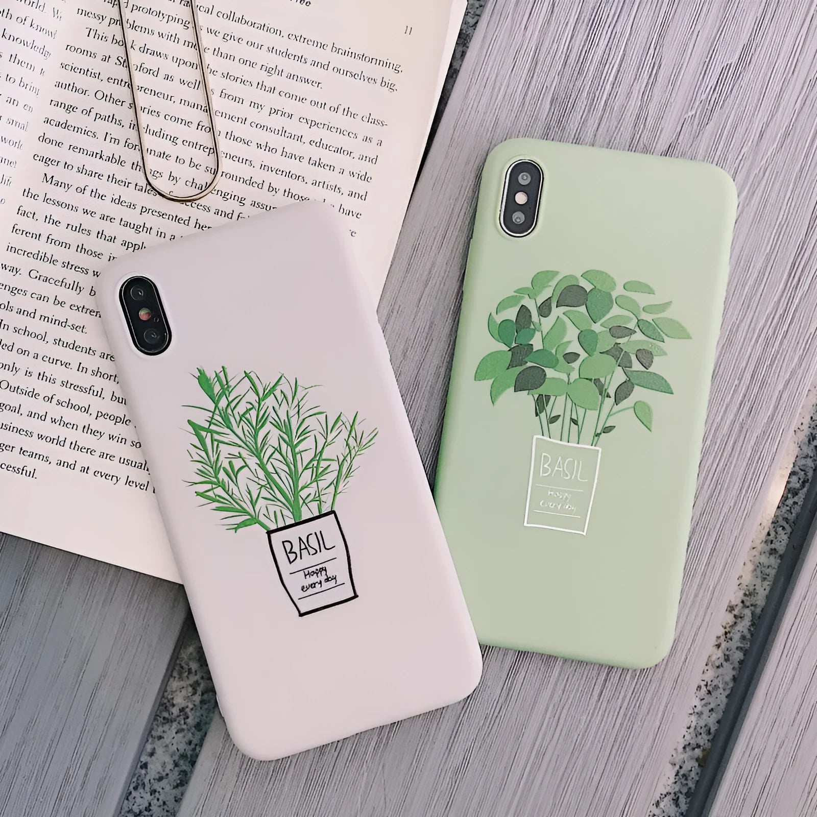 White silicone iPhone case with a detailed painted plant pattern on the back, showing its 360-degree protective edges.