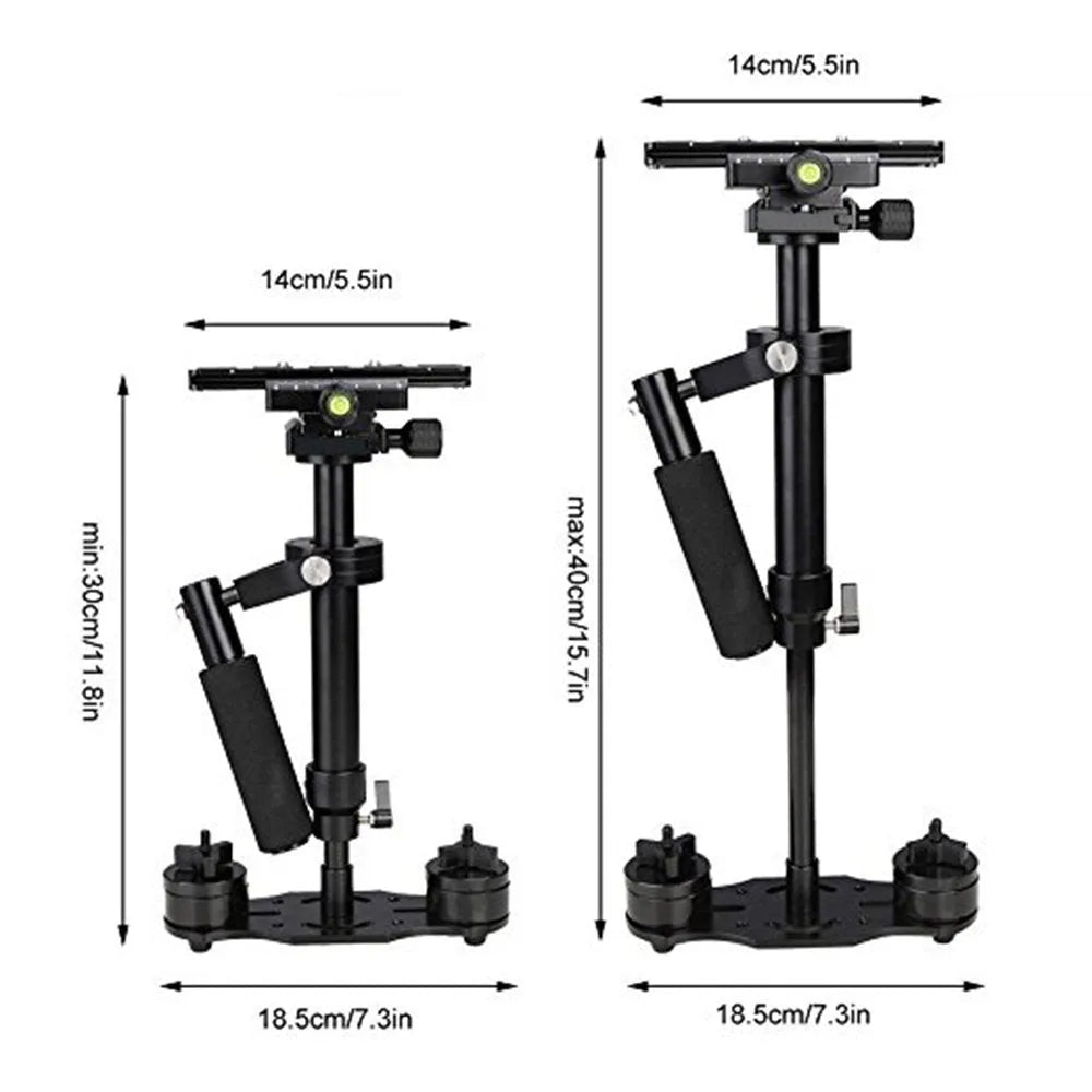 Black aluminium handheld camera stabiliser with adjustable height on a table.