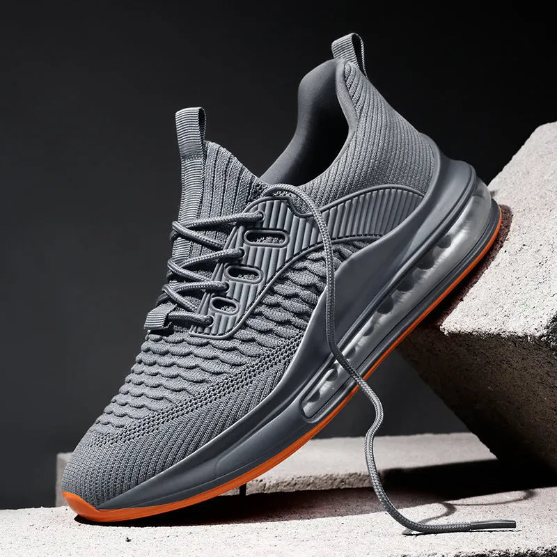 Men's low-top mesh running shoes in black with lace-up closure and rubber sole