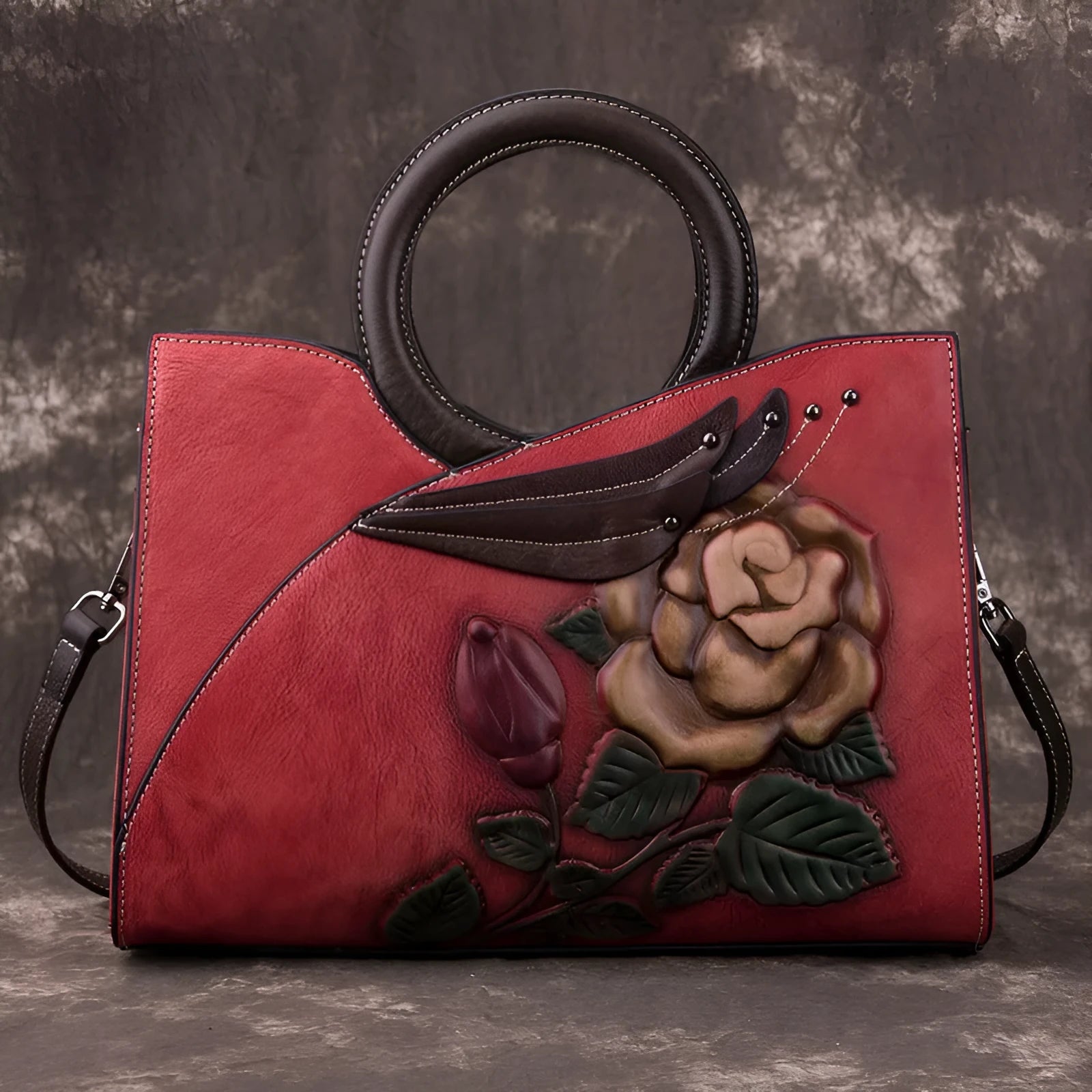 Handmade genuine leather women's handbag in contrasting colour with floral elements and zipper closure