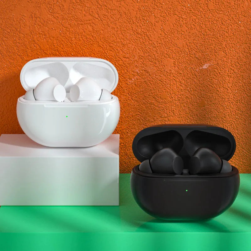Black and white Pro4 Bluetooth in-ear headsets inside a compact rectangular charging case.