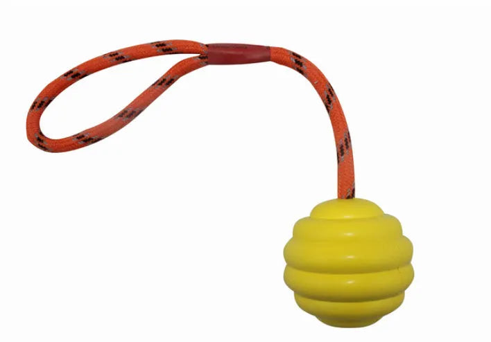 Rubber dog toy ball with rope knot in multiple colours including red, orange, yellow and blue