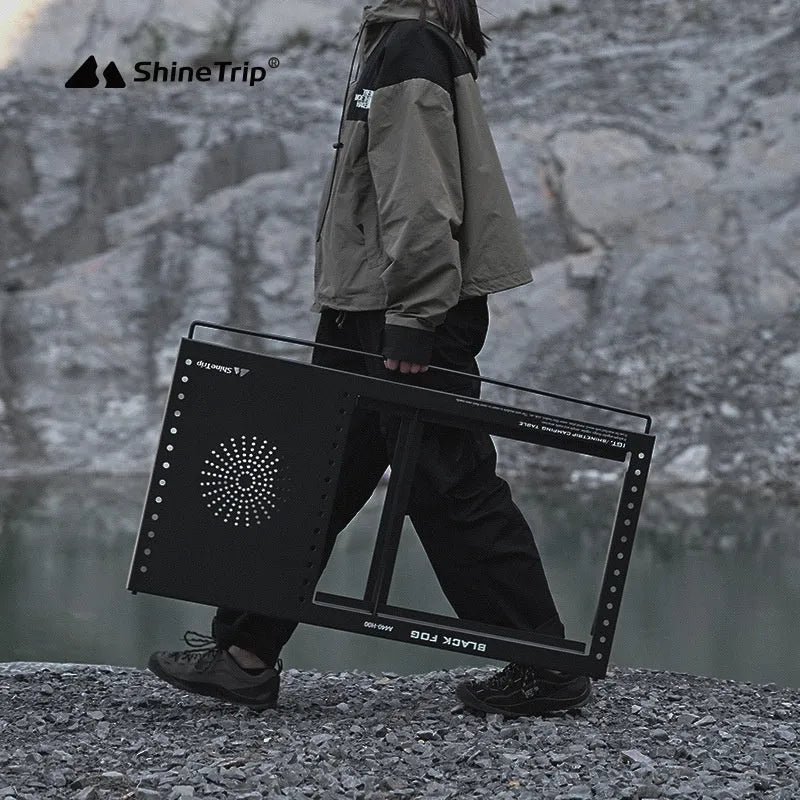 Folding carbon steel camping table with IGT modular system and multiple cell board design options.