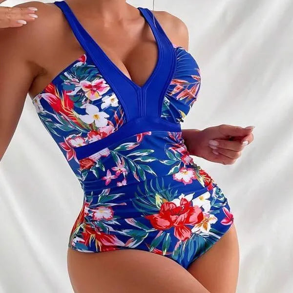 Floral patterned women's one-piece swimsuit with a backless bikini-style design