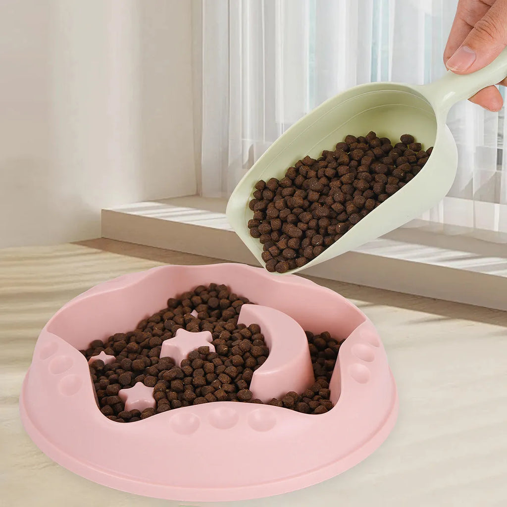 Moon star wings design slow feeder dog bowl in blue with non-slip base and internal ridges.