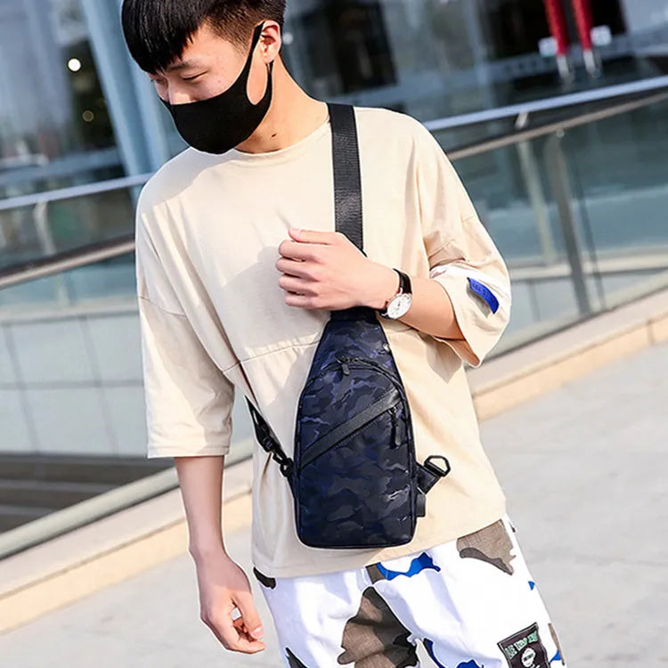 Men's camouflage crossbody chest bag with headphone hole in Camo Black