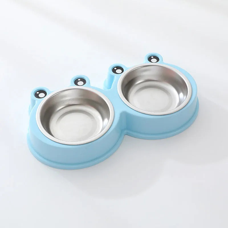 Stainless steel double compartment pet bowl for food and water on a silicone non-slip base.