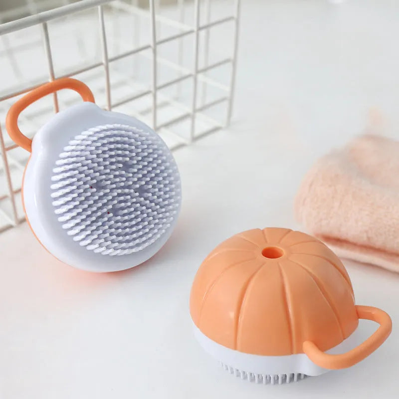 Orange TPR dog bath brush with shampoo dispenser and massage bristles