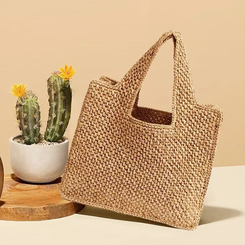 Natural straw woven bucket tote bag with double straps in beige colour
