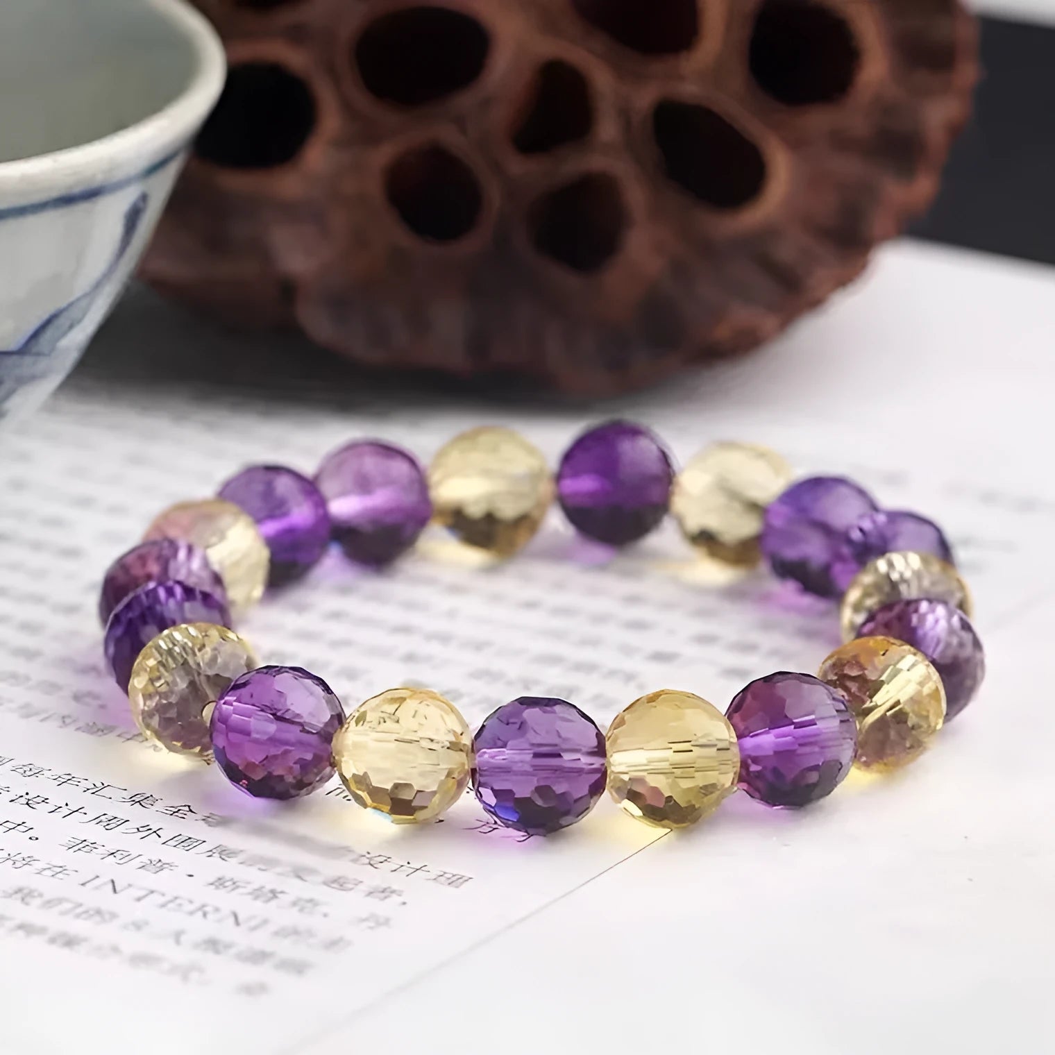 Handmade unisex bracelet with 128-faceted crystal beads and a decorative charm, available in multiple bead sizes.