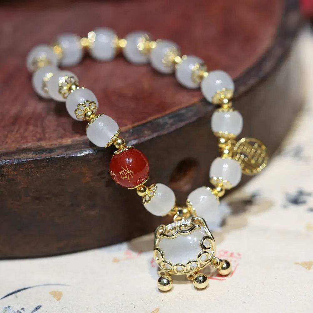 Women's Chinese-style coloured glaze bracelet with fugui safety lock and windmill glass charms