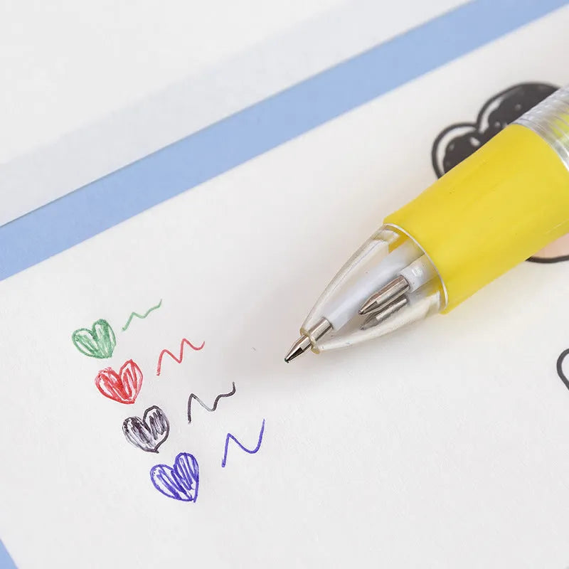Cartoon-themed four colour press ballpoint pen with plastic and silicone body on a white background.