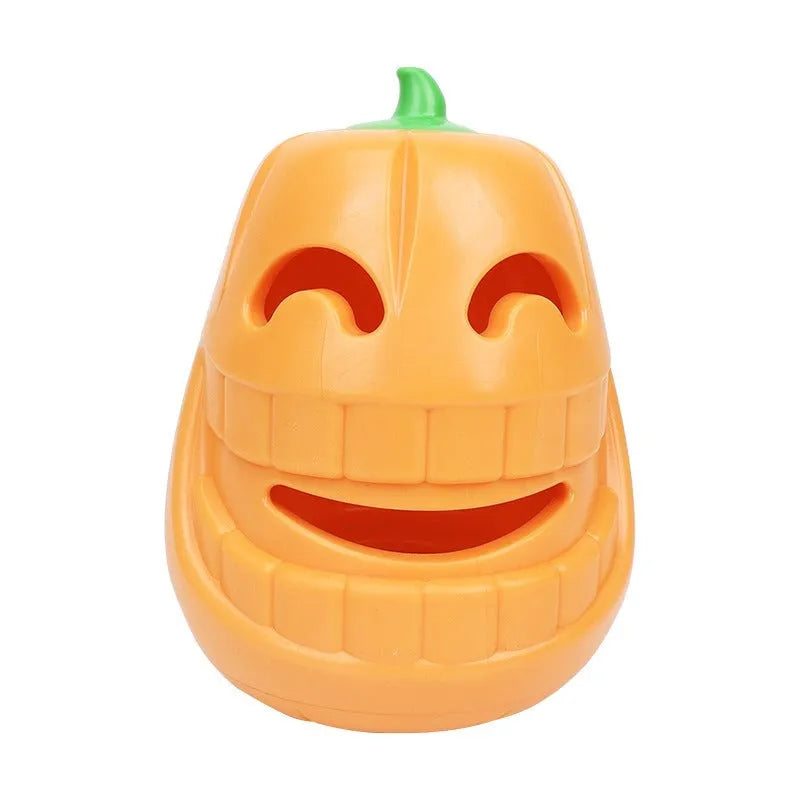 Orange Halloween pumpkin shaped dog chew toy with a black treat-dispensing funnel on top.