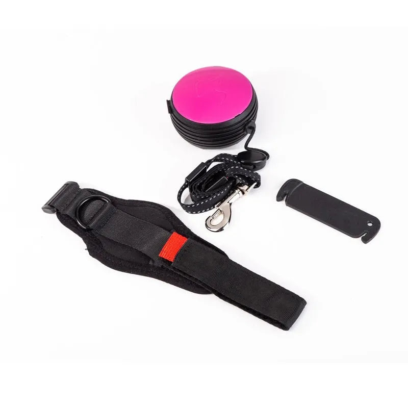 Automatic retractable dog leash with handle in a choice of six colours, extended on a 3m nylon cord.