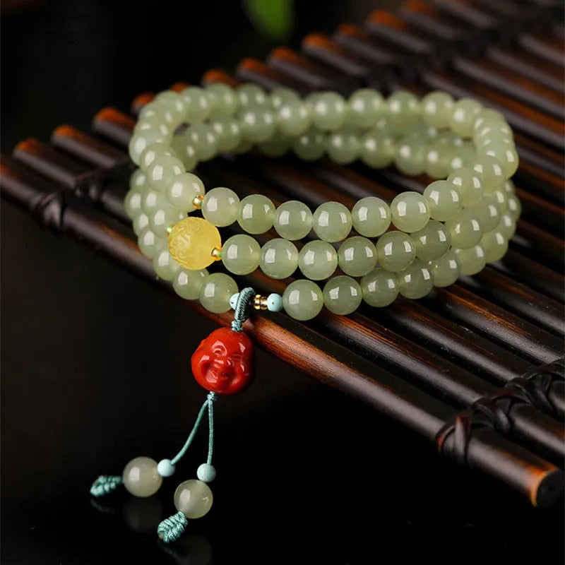 Pale blue Hetian jade bracelet with 6mm beads arranged in three-circle pattern