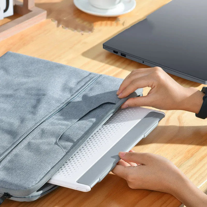 Dongdong portable alloy notebook stand for laptops up to 16 inches in black or white colour