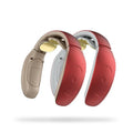 Small red and white intelligent cervical massager device for neck, back, and leg muscle relief.