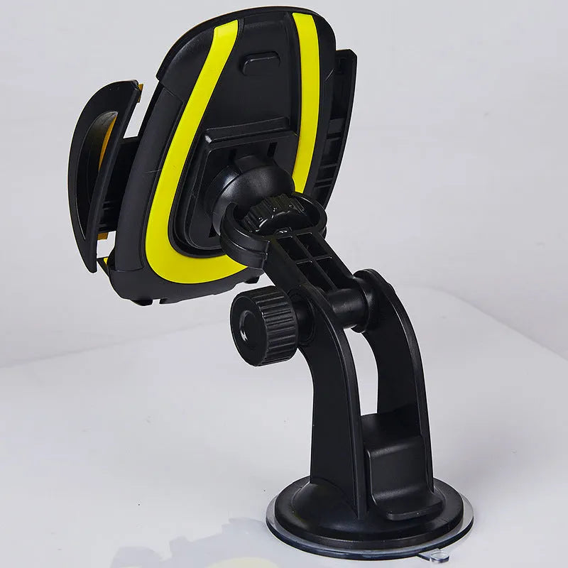 Red ABS suction cup car phone holder with U-shaped bracket mounted on a car dashboard.