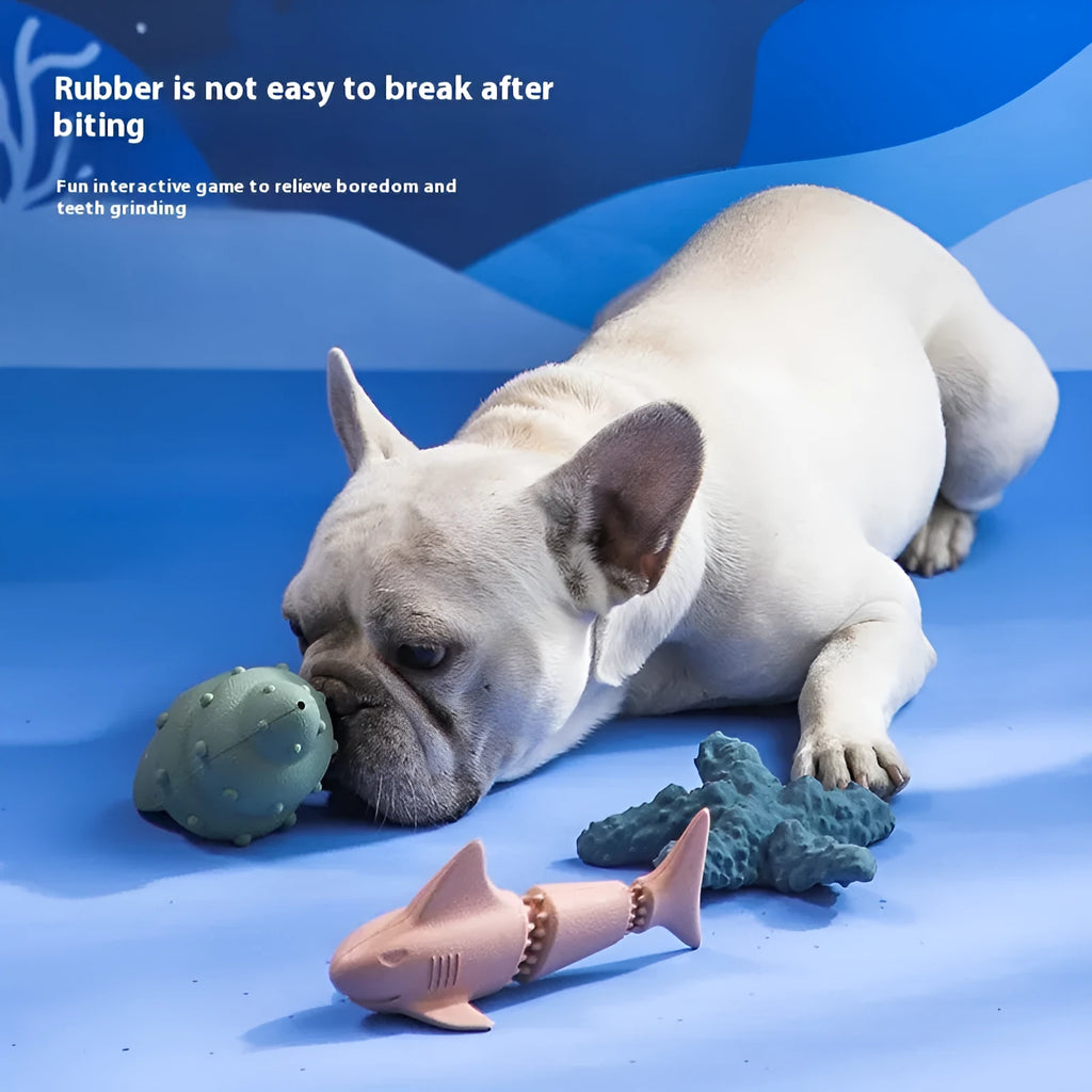 Blue rubber shark-shaped dog toy for chew play and mess-free feeding