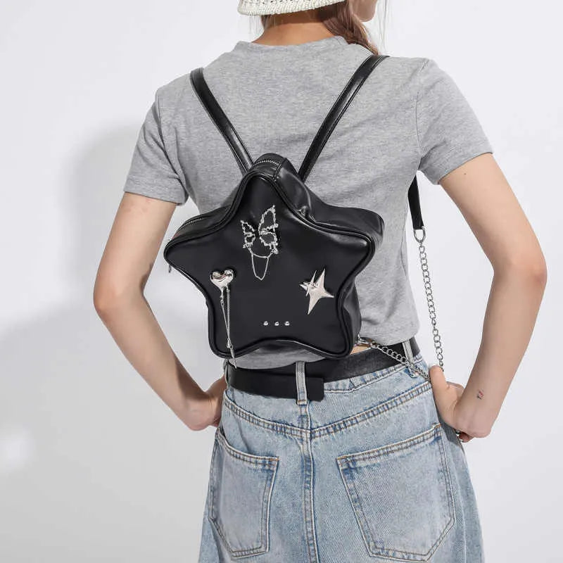 Women's soft PU leather mini backpack messenger bag in black, shown with crossbody strap