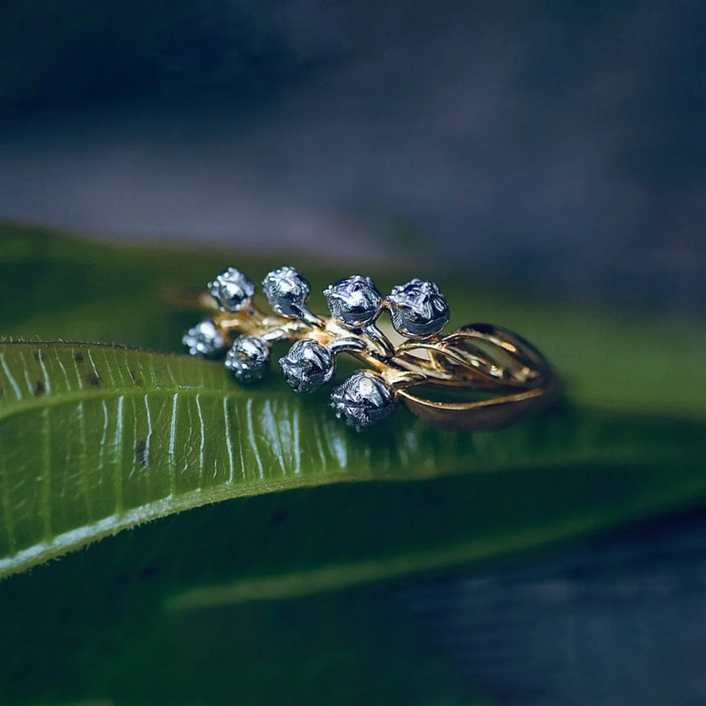 S925 pure silver bell orchid ring with micro inlay, champagne gold finish, on white background
