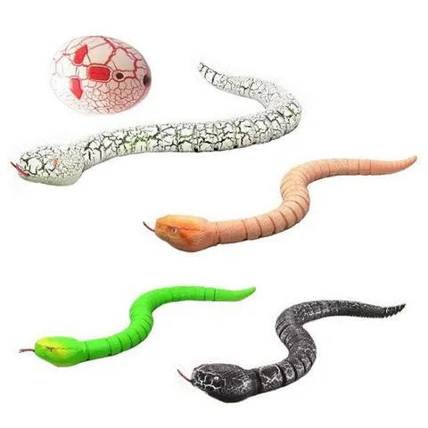 Novelty Remote Control Snake in green colour, 38 cm plastic toy with retractable tongue on a wooden floor
