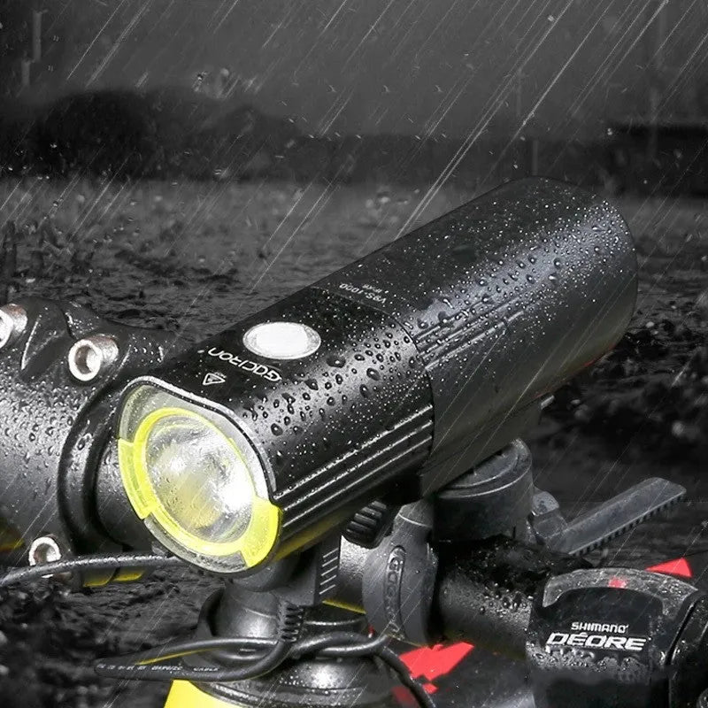 Waterproof bicycle headlight 1600 lumens CREE XML2 with power bank, black, mounted on handlebar
